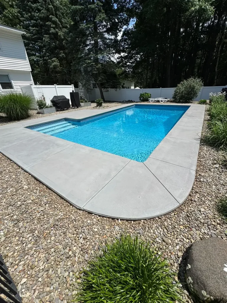 Broom finish concrete pool deck by Edges Unlimited in Clifton Park, NY