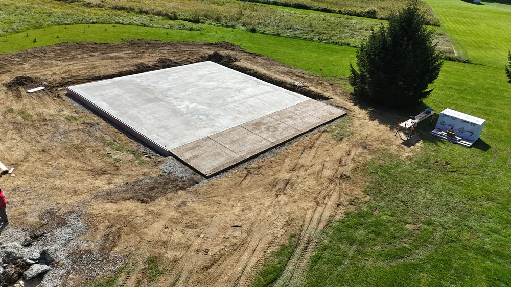 Edges Unlimited crew on a freshly poured concrete slab in Troy, NY